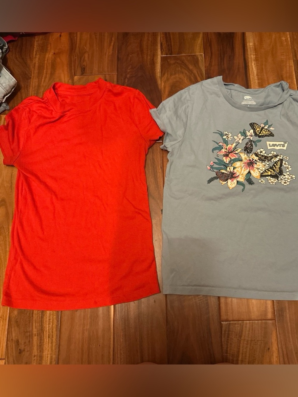 a new day Red red tee Levi’s graphic design
